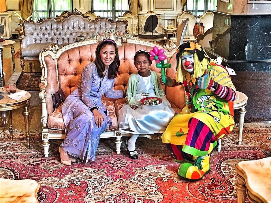 ‘As she’s always wanted to meet a real-life princess, we devised a plan for her to come and meet me at the palace,’ says Zatashah, who is royal patron of Make-A-Wish-Malaysia, speaking about making eight-year-old Adriana’s wish come true. Photo: Tengku Zatashah